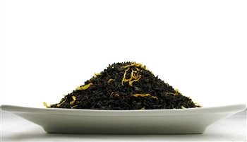 Organic Mango Tea, An Assam Black tea that has aromatic mango bits and natural flavours โ 1/2lb Tea Bag