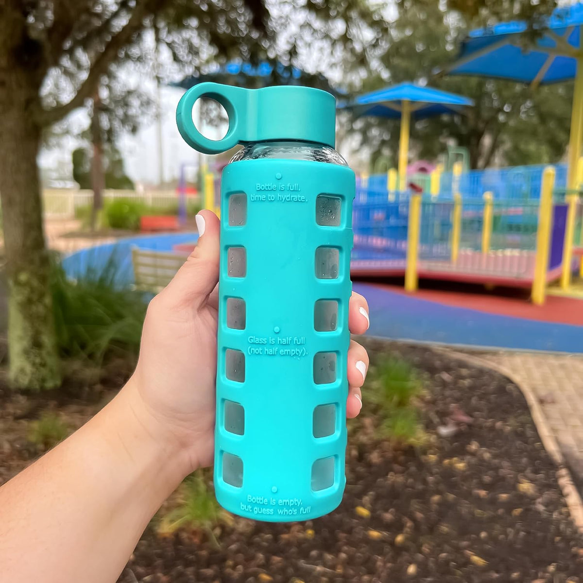 purifyou 40oz / 32oz / 22oz / 12oz Borosilicate Glass Water Bottle with Time & Volume Markers, Silicone Sleeve, Stainless Steel Lid β Reusable Glass Bottle for Water & Juice (12oz Aqua Blue)