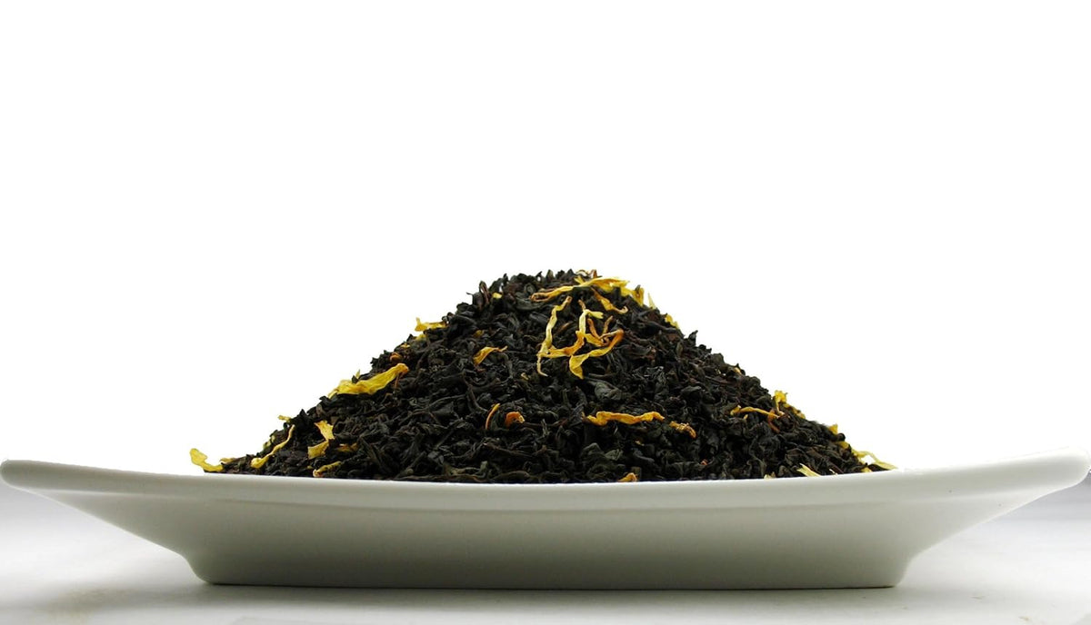Organic Mango Tea, An Assam Black tea that has aromatic mango bits and natural flavours –2.80 OZ Tea Tin