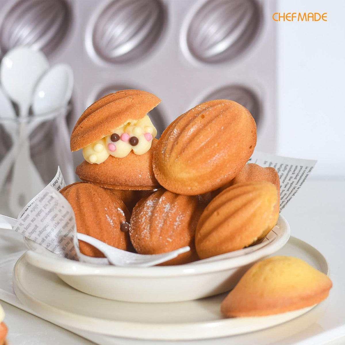 CHEFMADE Muffin Cake Pan, 12-Cavity Non-Stick Rugby-Shaped Bakeware for Oven Baking (Champagne Gold)