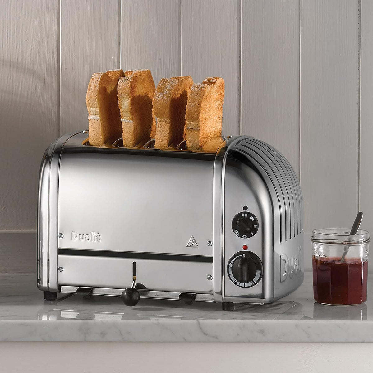 Dualit Classic 4 Slice NewGen Toaster - Stainless Steel - Hand Built in the UK - Replaceable ProHeat elements - Defrost Bread - Mechanical Timer - Polished Classic Toaster