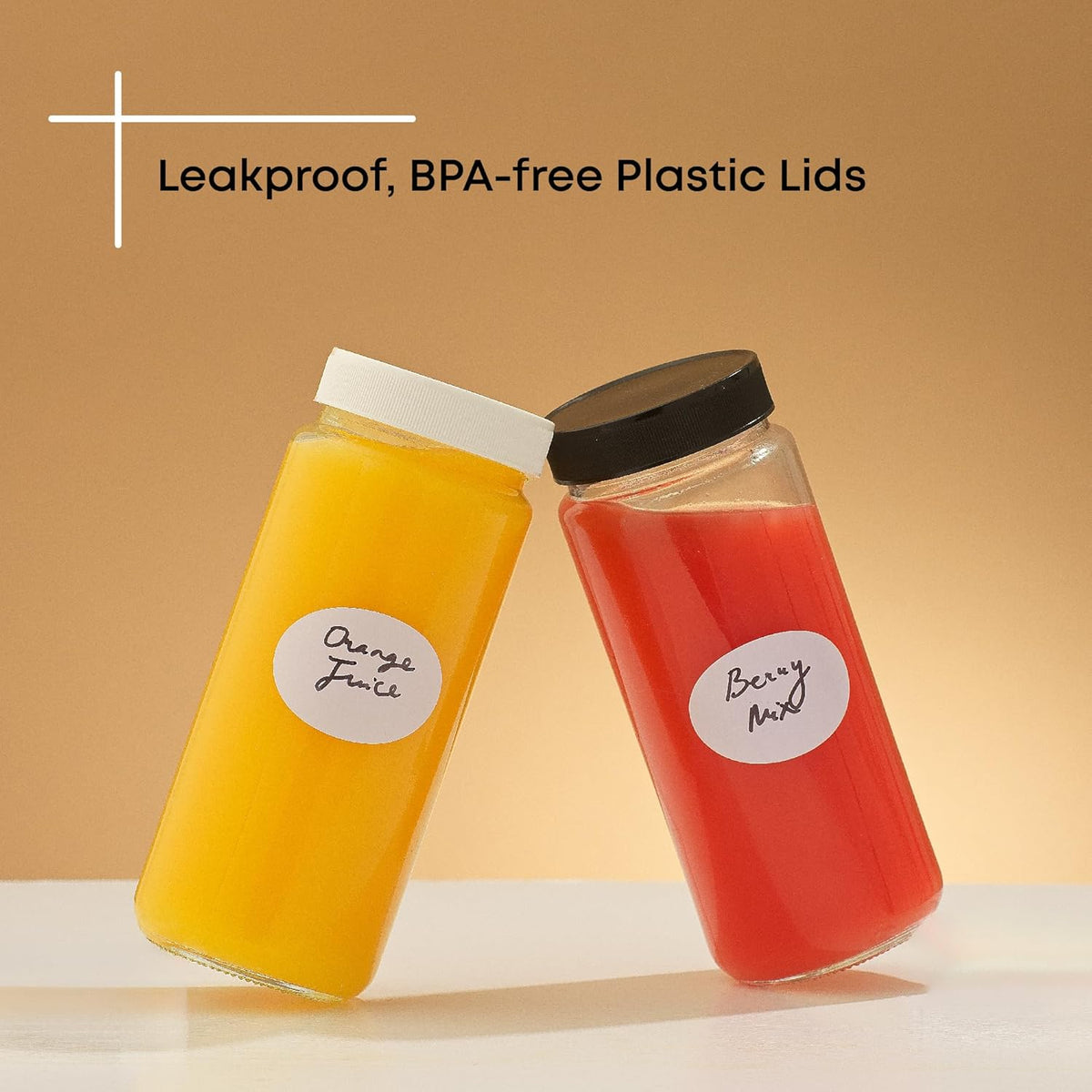 JoyJolt Glass Juice Bottles, 16 oz Glass Bottles with Caps. Set of 8 Juice Containers with Lids for Fridge, and Labels for Juice Jars. Glasses for Juice, Cold Brew Bottles, Smoothie Jars